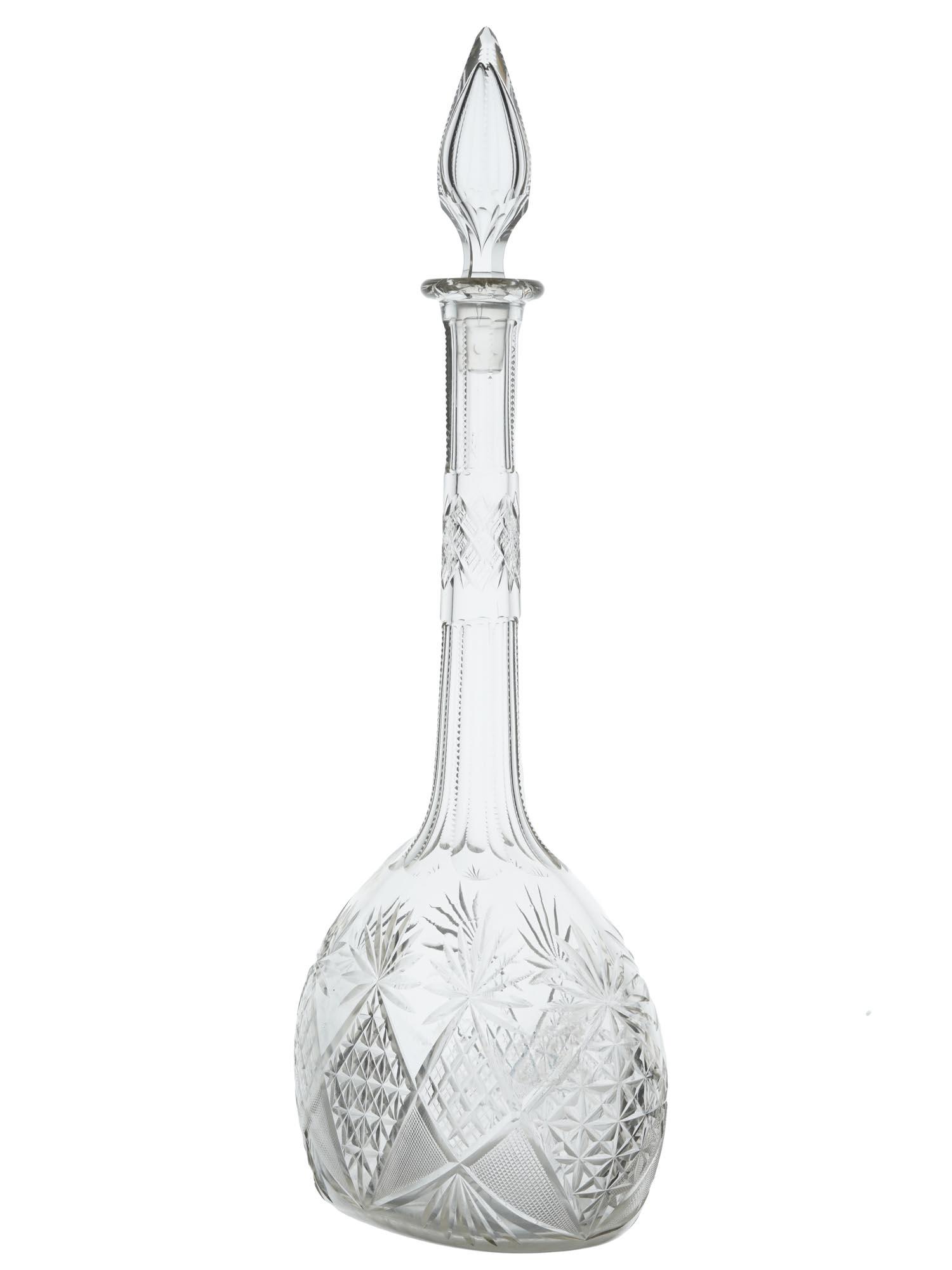 VINTAGE FRENCH BACCARAT TSAR MODEL WINE CARAFE: A vintage French Baccarat Tsar model crystal glass hand formed, ground and polished wine carafe with a pointed stopper. Features deep cross designs to the body and long neck with wide verticals. Circa