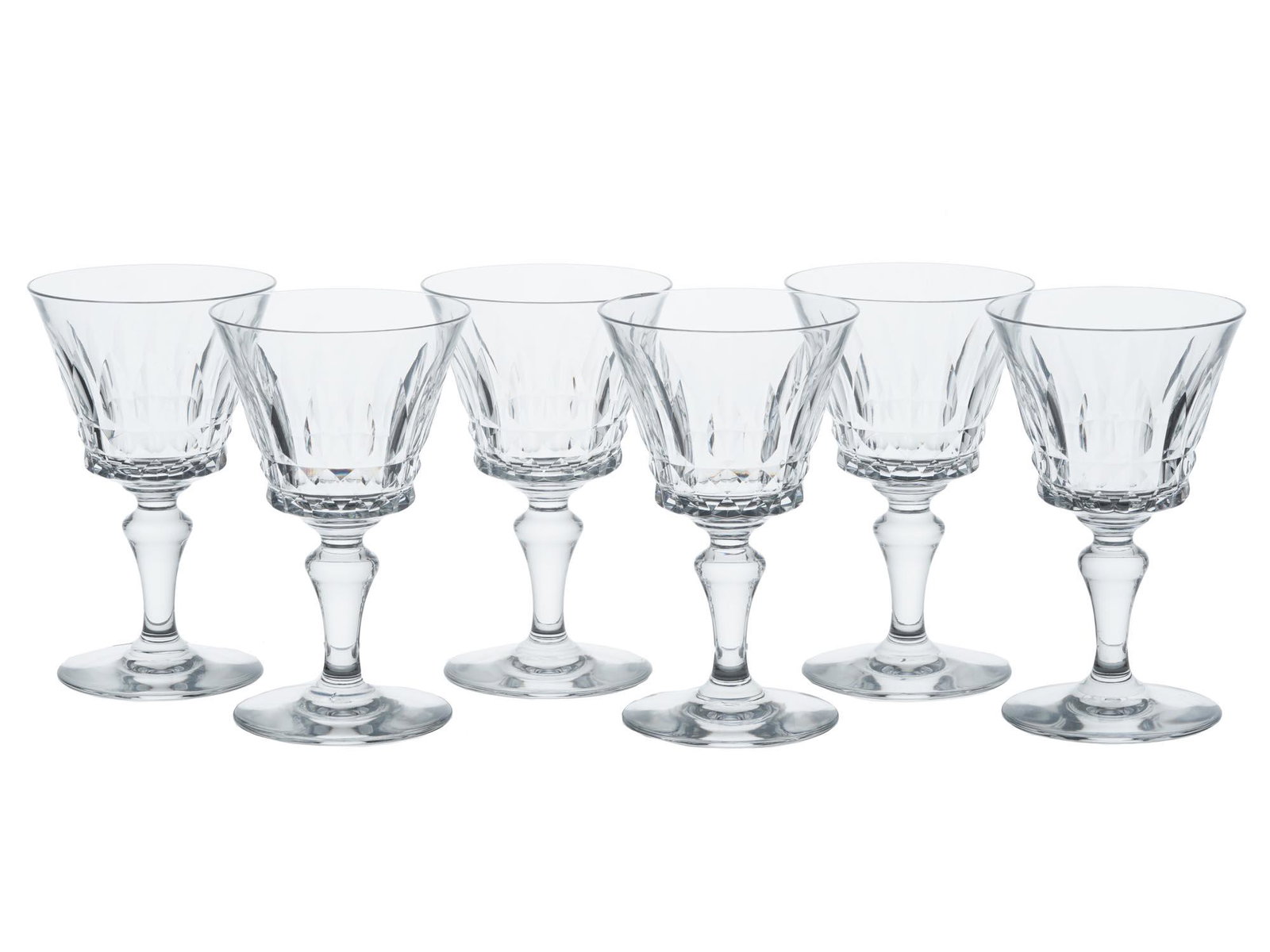 VINTAGE BACCARAT PICCADILLY CRYSTAL CUT GLASSES: A set of six vintage French Baccarat claret wine crystal glasses manufactured in Piccadilly cut pattern featuring cross designs on the base of the bowl with wide verticals reaching up, on a lady leg t