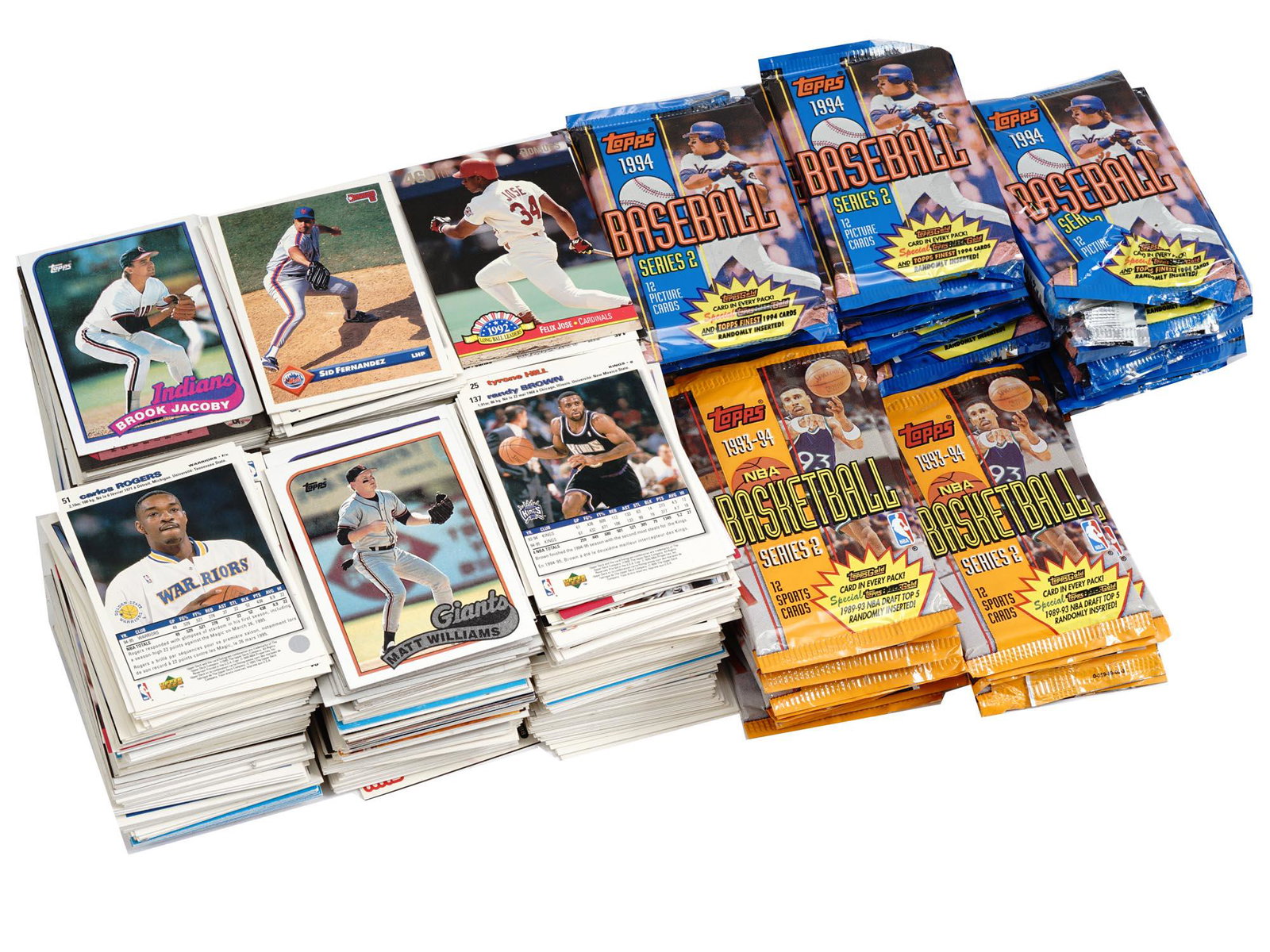 LARGE COLLECTION OF BASEBALL AND BASKETBALL CARDS: A large collection of various American baseball and basketball trade cards with printed portrait photos of sportsmen. The collection includes a large group of Topps cards, 1994 Baseball Series 2, 12 P
