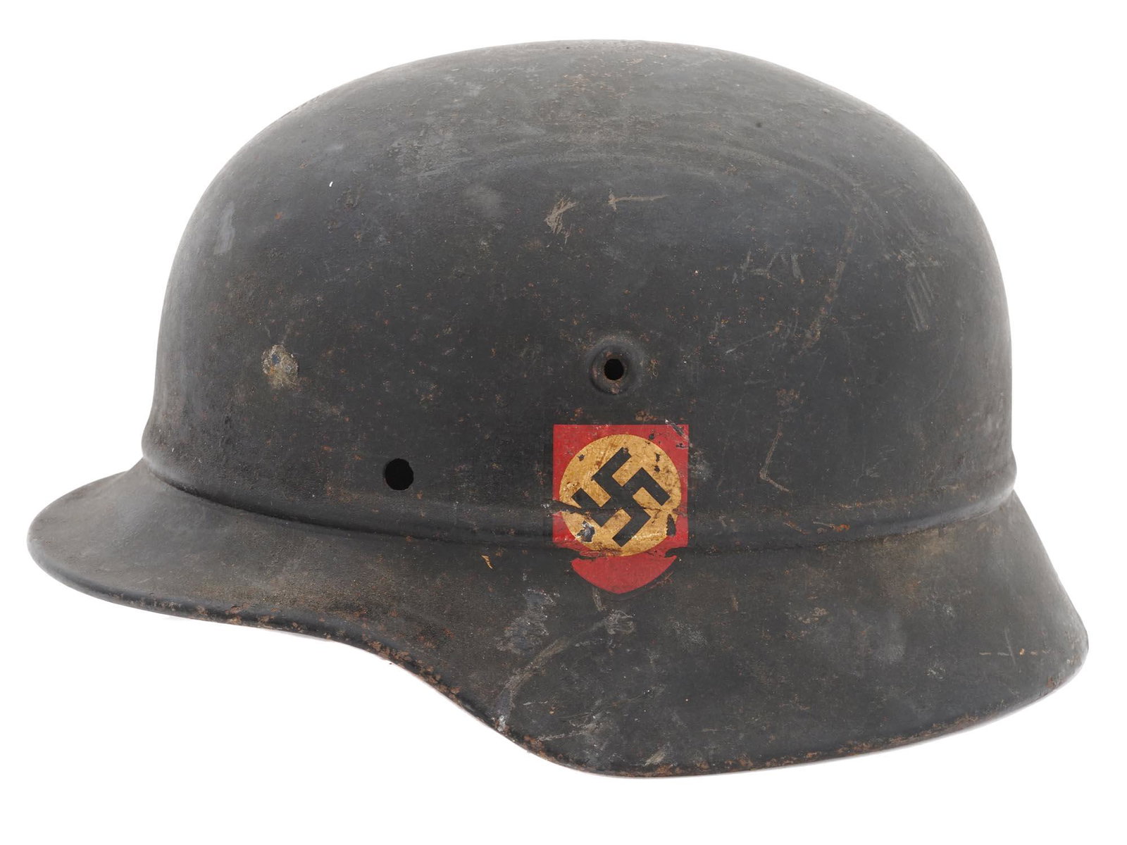 WWII NAZI GERMAN SS MILITARY HELMET STAHLHELM: A World War II Nazi German military helmet, known as the Stahlhelm. A steel helmet intended to provide protection against shrapnel and fragments of grenades. Distinctive coal scuttle shape, matte blac