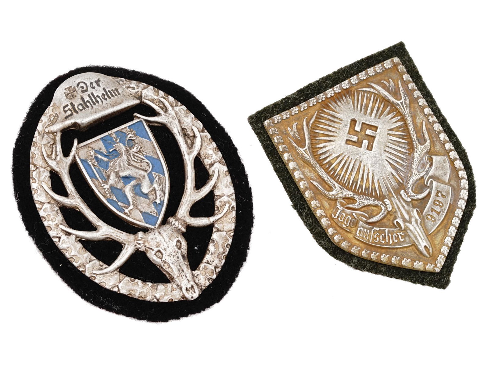 WWI WWII GERMAN HUNTING ASSOCIATION PIN BADGES: Two German hunting association badges including a WWI Bavarian Der Stahlhelm hunting association pin badge with a head and horns of a deer and a wreath with a helmet on top and an enameled coat of arm