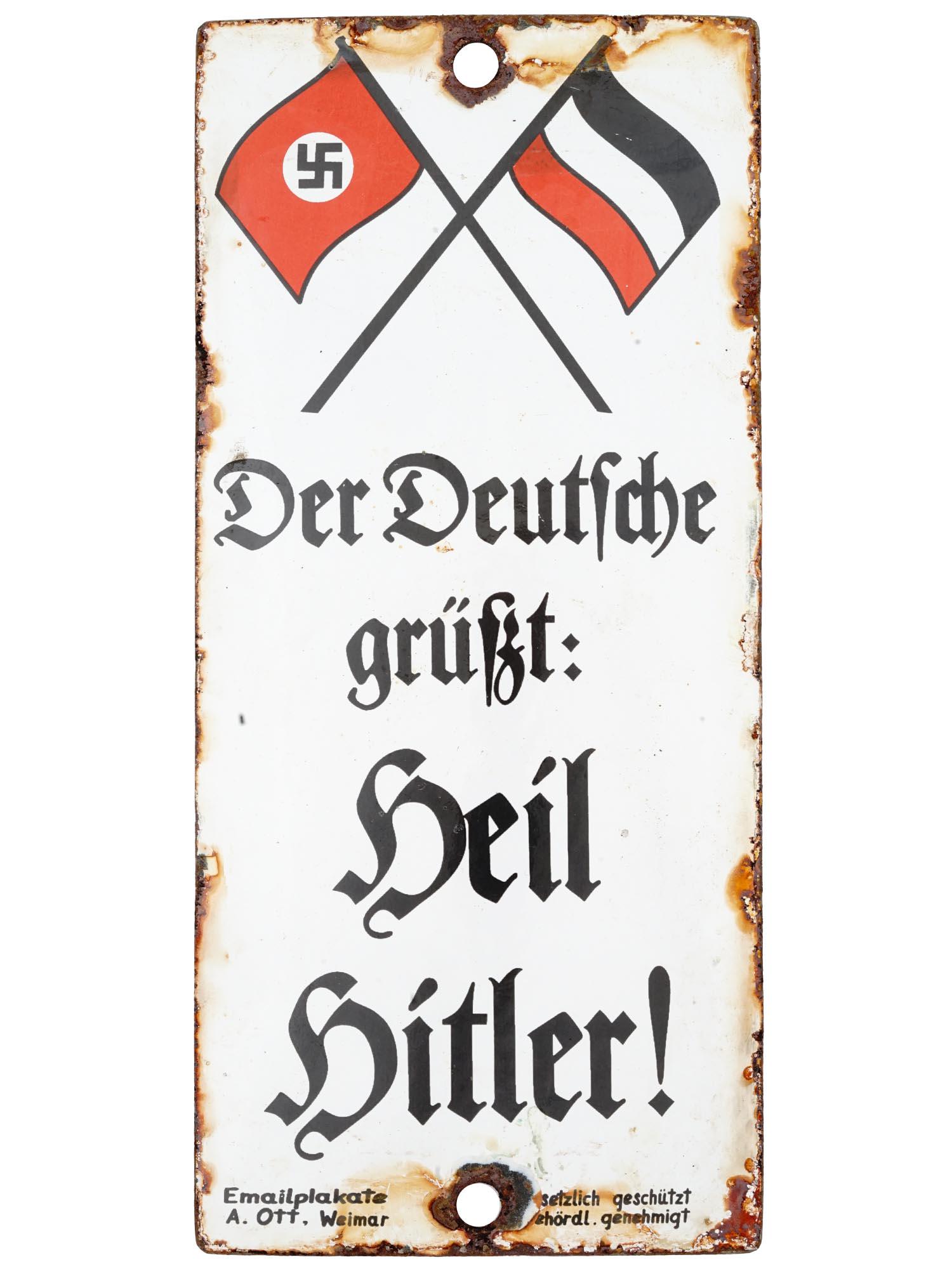 WWII NAZI GERMAN NSDAP PROPAGANDA STREET SIGN: A WWII Nazi German enameled tin plate, a street sign with a Third Reich flag, a flag of Yugoslavia, and inscription Der Deutsche grusst: Heil Hitler! The German greets: Heil Hitler! Technical inscript
