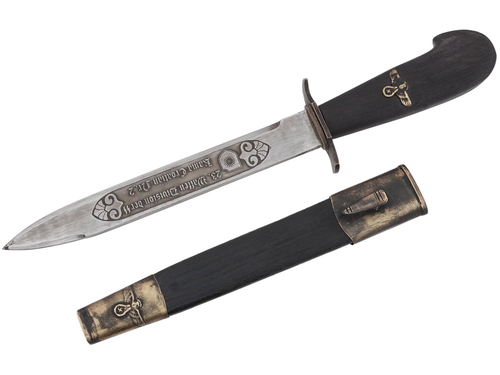 WWII GERMAN WAFFEN DIVISION KAMA CROATIAN DAGGER: A WWII Nazi German Waffen Division der SS Kama dagger featuring a steel pointed blade with an engraved inscription in German which reads: 23 Waffen Division der SS Kama Croatian Nr. 2. Marked on the r