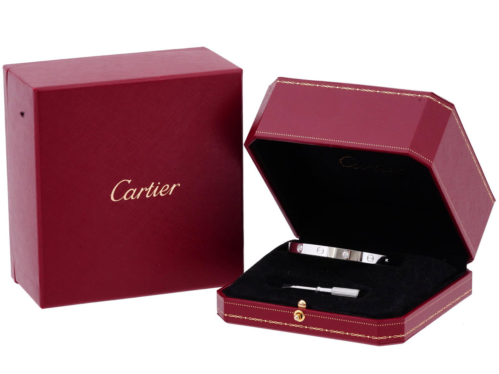 18K WHITE GOLD AND DIAMONDS CARTIER LOVE BRACELET: A 18K White Gold Cartier bracelet from the Love collection. Designed in 1969. The oval shaped bracelet composed of two rigid arcs which is worn on the wrist and removed using a specific screwdriver. T