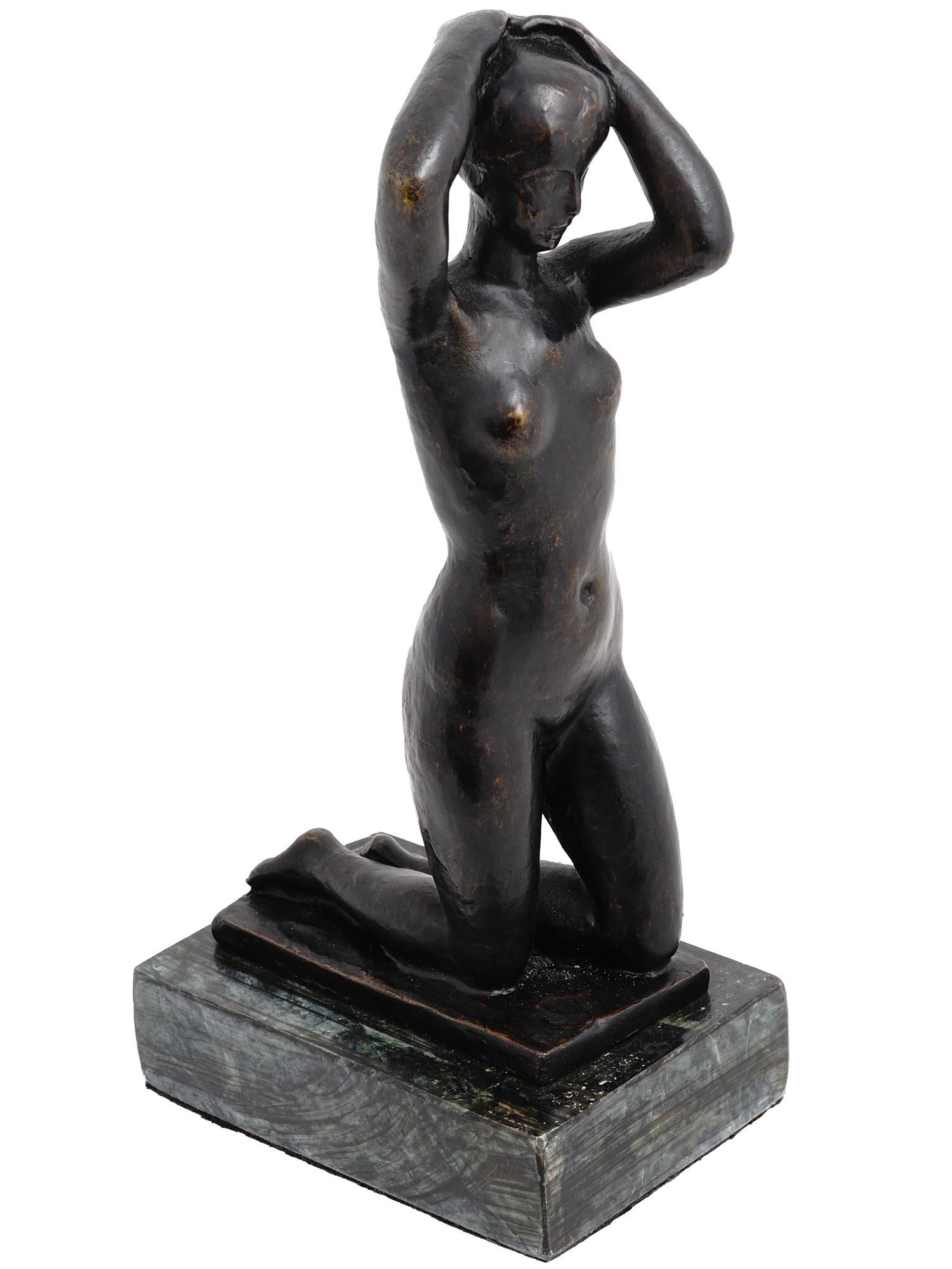 ARISTIDE MAILLOL ANTIQUE FEMALE BRONZE SCULPTURE: Aristide Maillol, French, 1861 to 1944, an antique patinated bronze sculpture. The sculpture depicts a female nude figure standing on her knees and throwing her hands over her head. Mounted on a recta