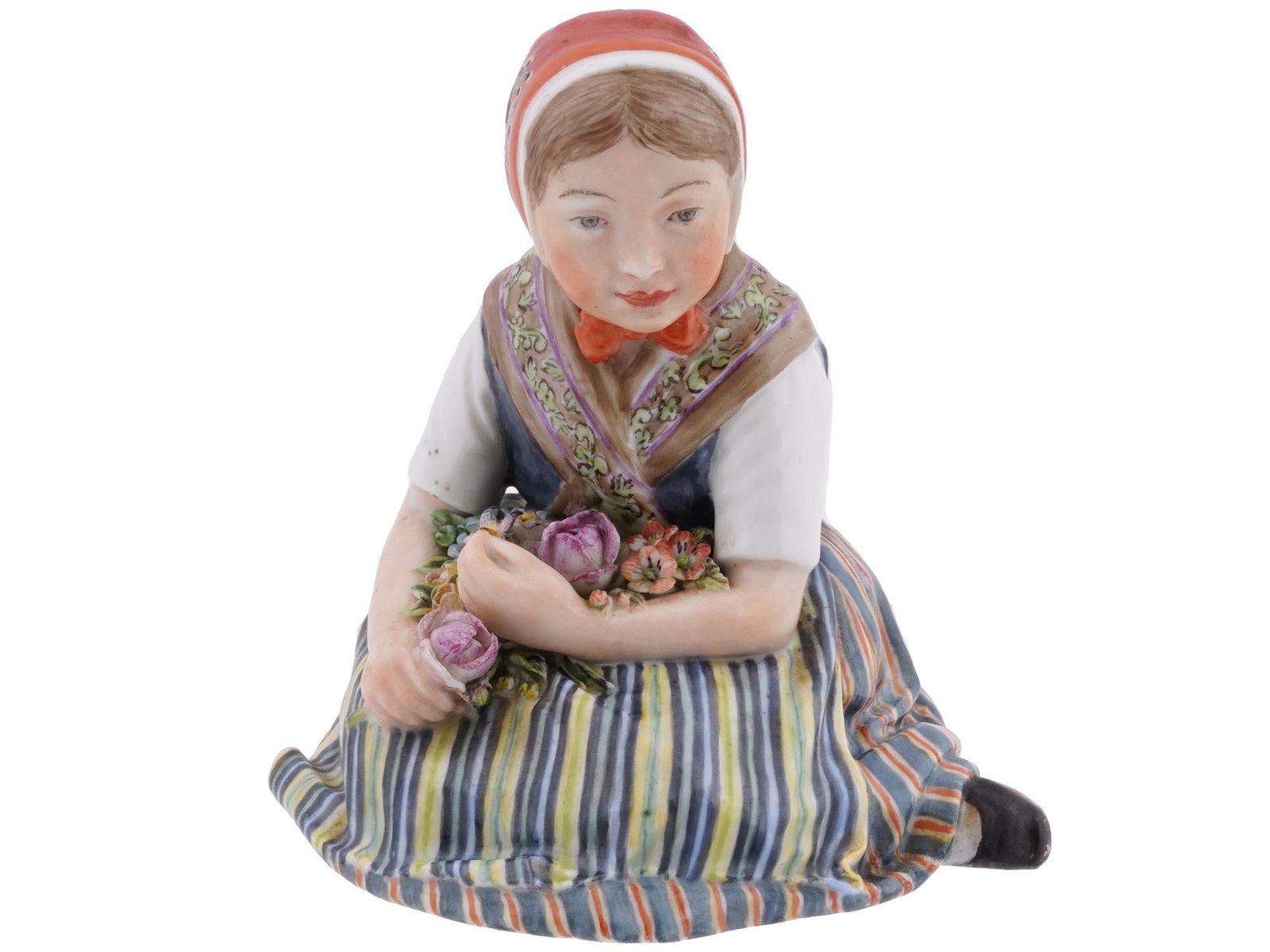 ANTIQUE ROYAL COPENHAGEN SCHLESWIG GIRL FIGURINE: An antique Danish Royal Copenhagen hand painted glazed porcelain figurine depicting a girl sitting with flowers titled Flower Girl in National Dress from Schleswig. Modeled by Carl Martin Hansen, 1877