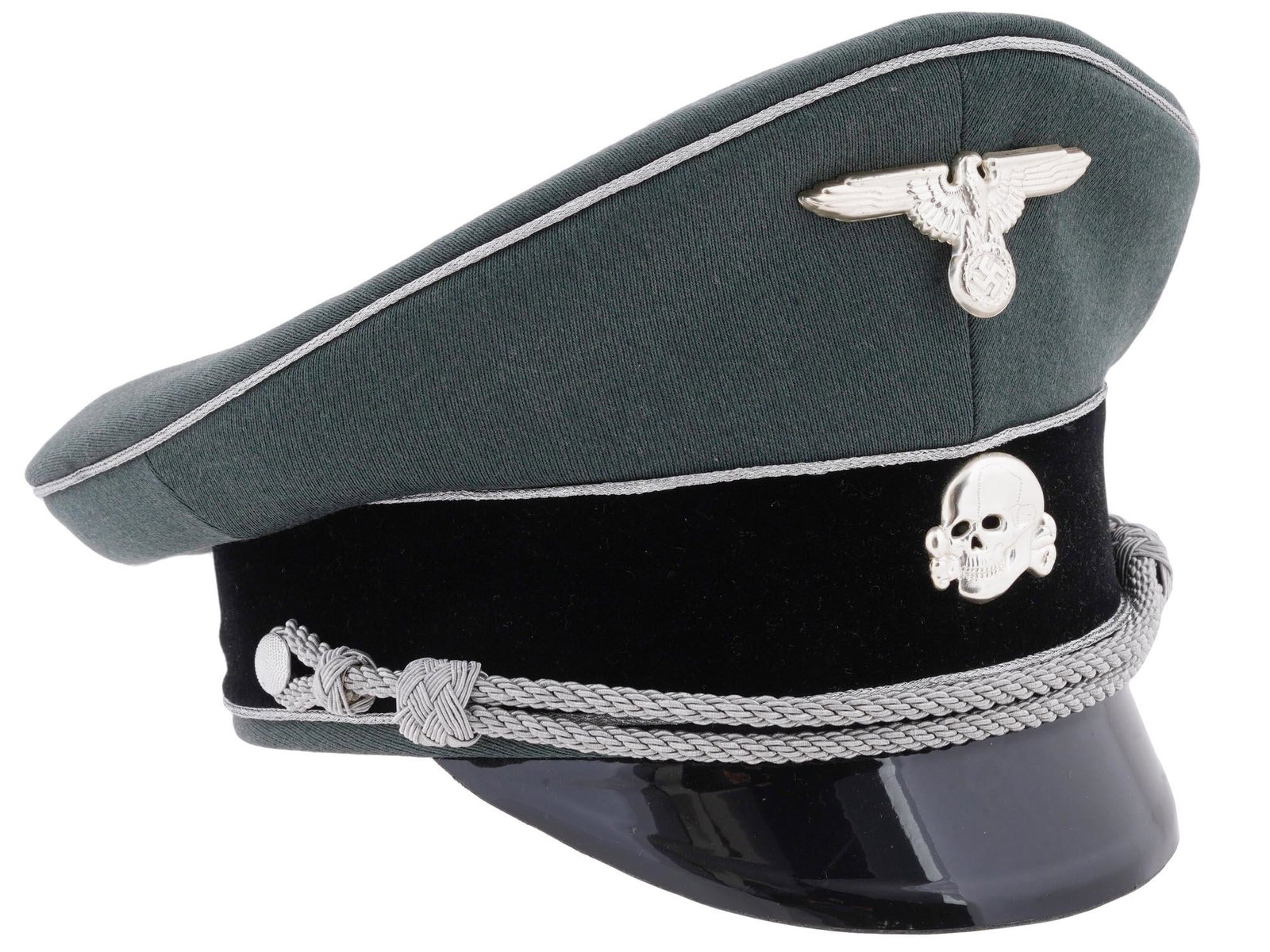 GERMAN WWII WAFFEN SS GENERALS VISOR HAT: A WWII Nazi German Waffen SS generals visor hat of tricot with a fine twill weave pattern of parallel running ribs of medium width and height. The cap features a traditional high peak crown with tight