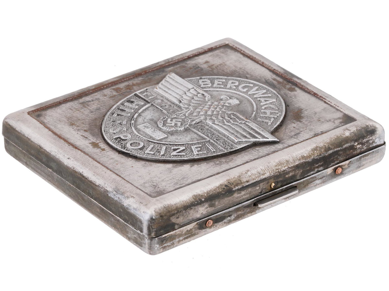 WWII ERA NAZI GERMAN TYROL POLICE CIGARETTE CASE: A WWII Nazi German Third Reich Mountain Auxiliary Tyrol Vorarlberg Police cigarette case. The case is metal alloy construction. The case is adorned with a metal plaque featuring an image of a Nazi eag