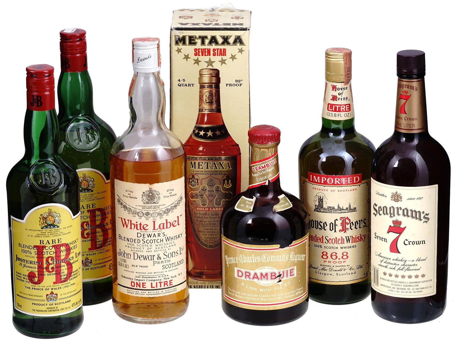 COLLECTION OF VINTAGE LIQUEUR BOTTLES: A large lot of liqueur vintage bottles including Justerini and Brooks scotch whisky, House of Peers whisky, Seagrams Seven Crown whisky, Dewars White Label whisky, Drambuie whisky liqueur, Metaxa liqu