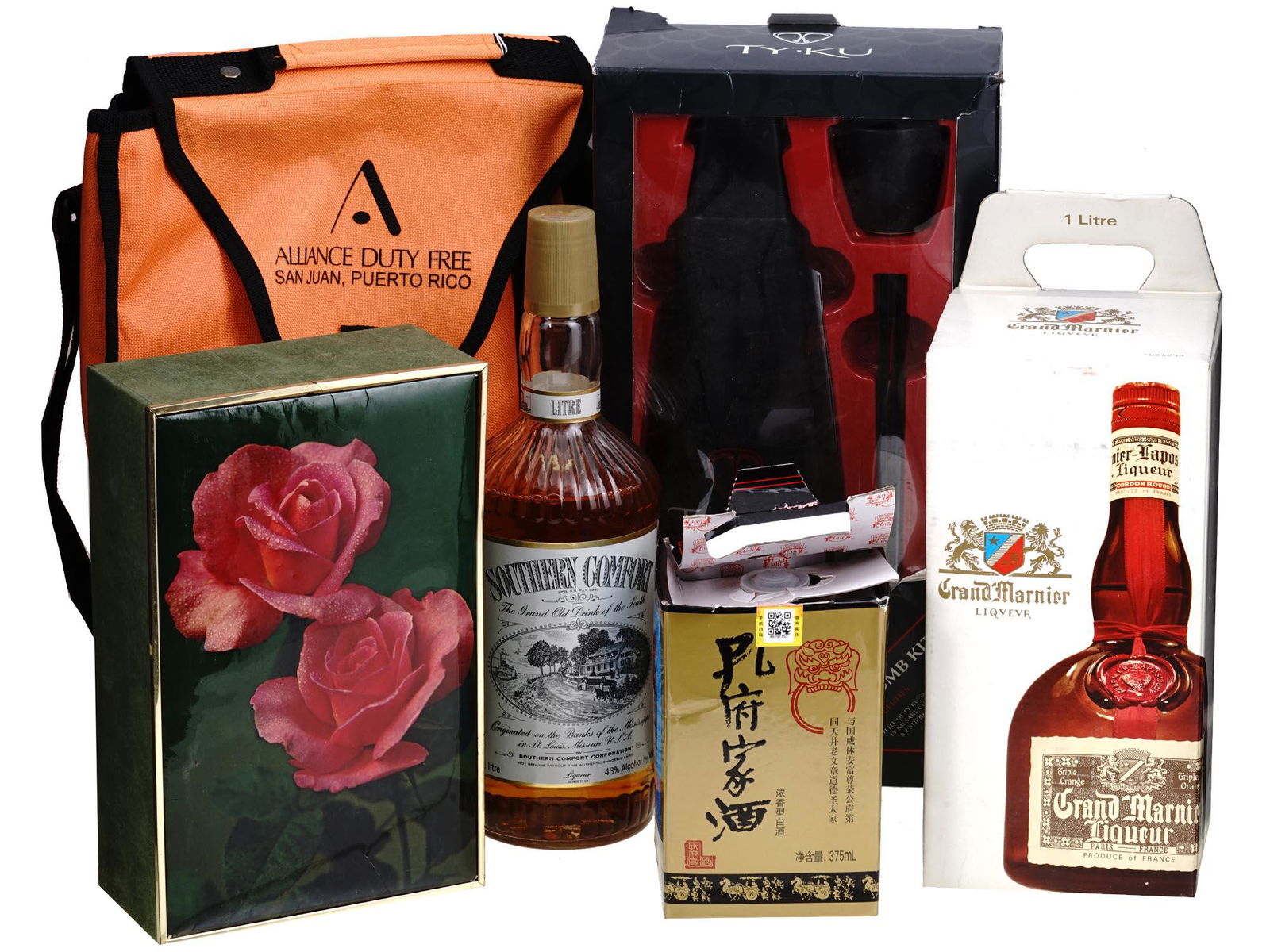 COLLECTION OF VINTAGE LIQUEUR BOTTLES: A large lot of liqueur vintage bottles including Southern Comfort whisky, Grand Marnier liqueur, Confucius Family liqueur, Disaronno amaretto, Tyku sake. Also includes a Baccaridi bag. For collecting