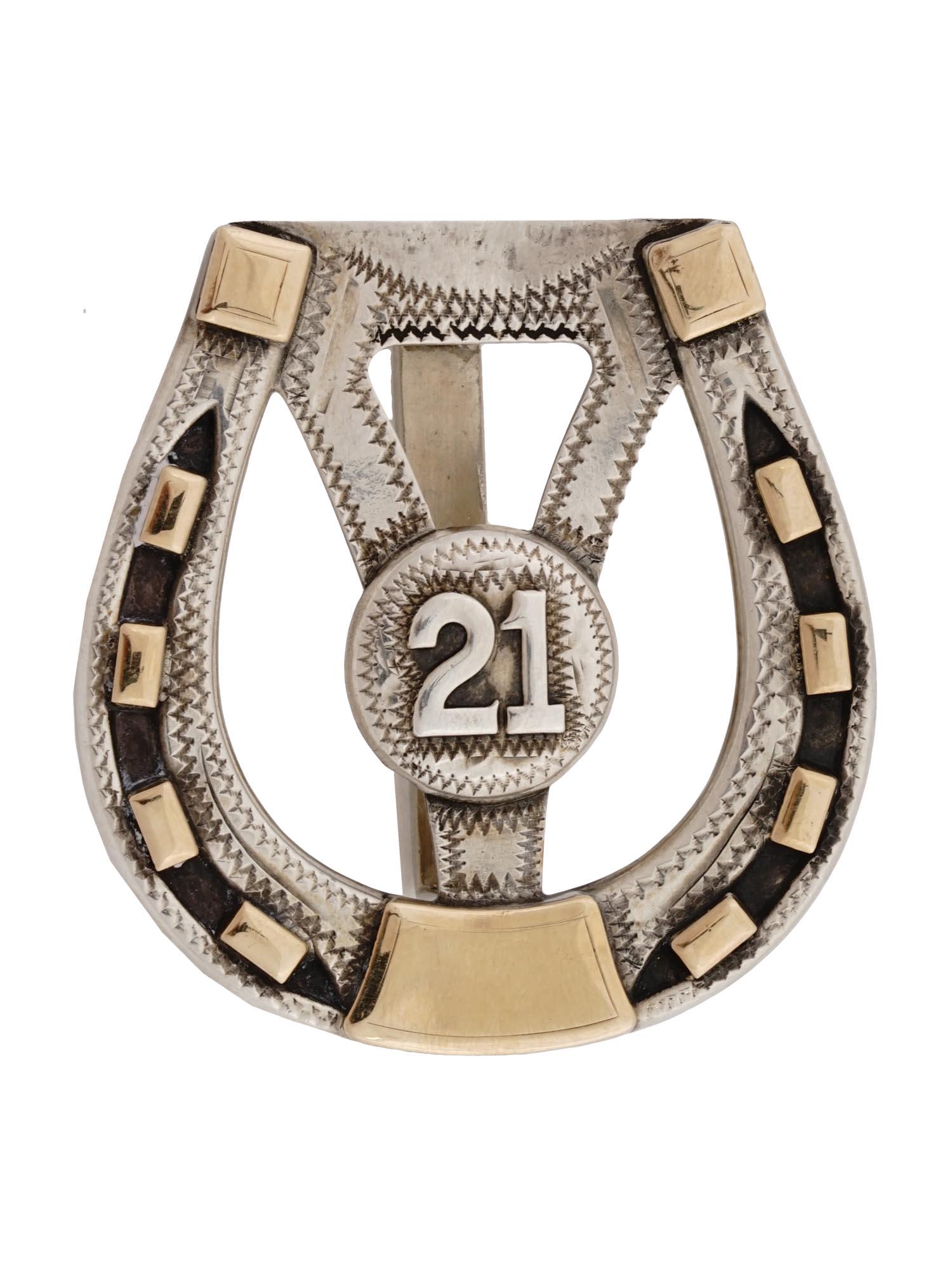 HAYWARD 21 CLUB 10K GOLD STERLING SILVER MONEY CLIP: A Mid 20th century Hayward Sterling Silver and 10K Gold money clip from the NYC 21 Club. The clip features an image of the number 21 inside a horseshoe. Unmarked. Total weight: 22 g. Vintage and Moder