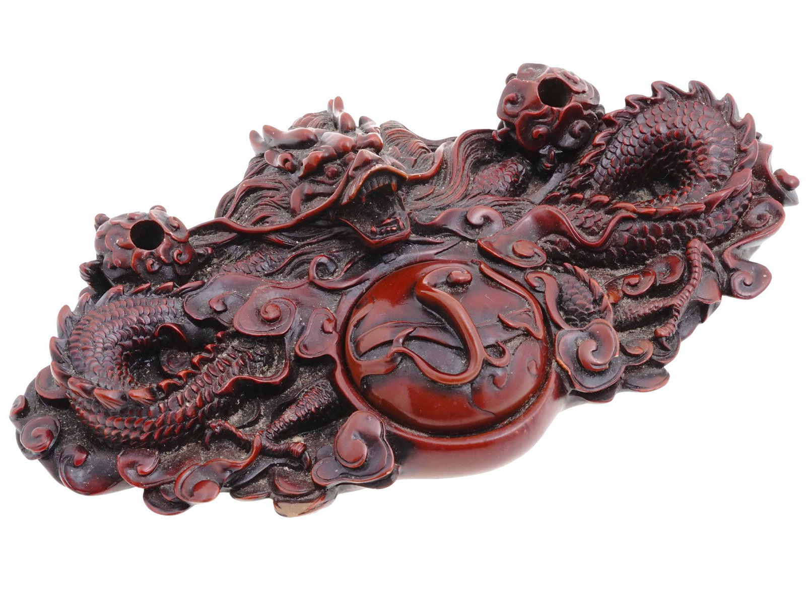 VINTAGE CHINESE CINNABAR DRAGON PEN AND INKWELL HOLDER: A vintage Chinese Cinnabar lacquer pen and inkwell holder adorned with intricate carvings of dragons, a symbol of power, strength, and good fortune in Chinese culture. Designed to hold writing instrum