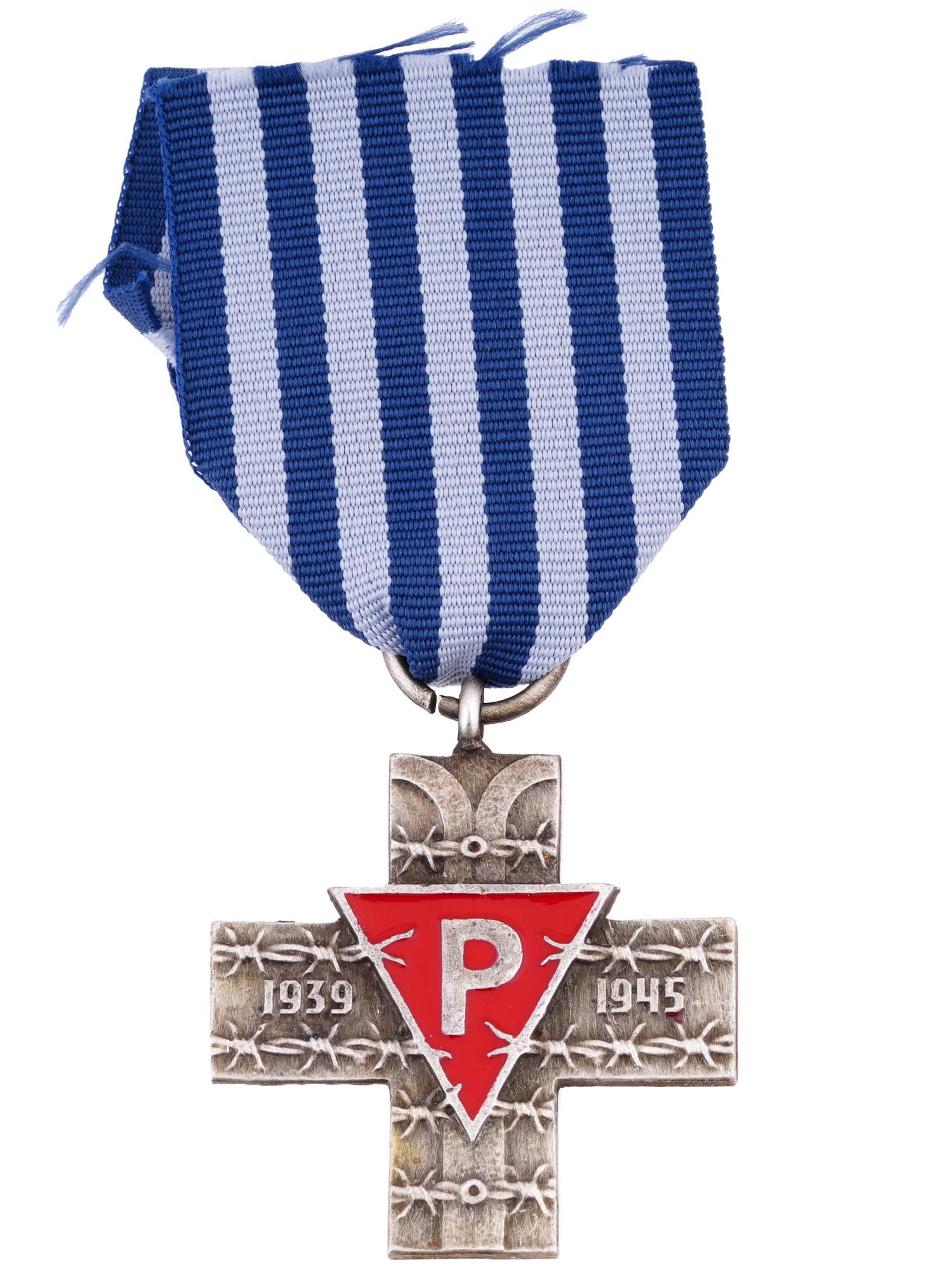 POST WWII POLISH AUSCHWITZ CROSS AWARD MEDAL: A post WWII Polish Auschwitz Cross medal awarded to honor survivors of Nazi German concentration camps. Features a silver Greek cross on a blue and white striped ribbon. The obverse shows barbed wire 