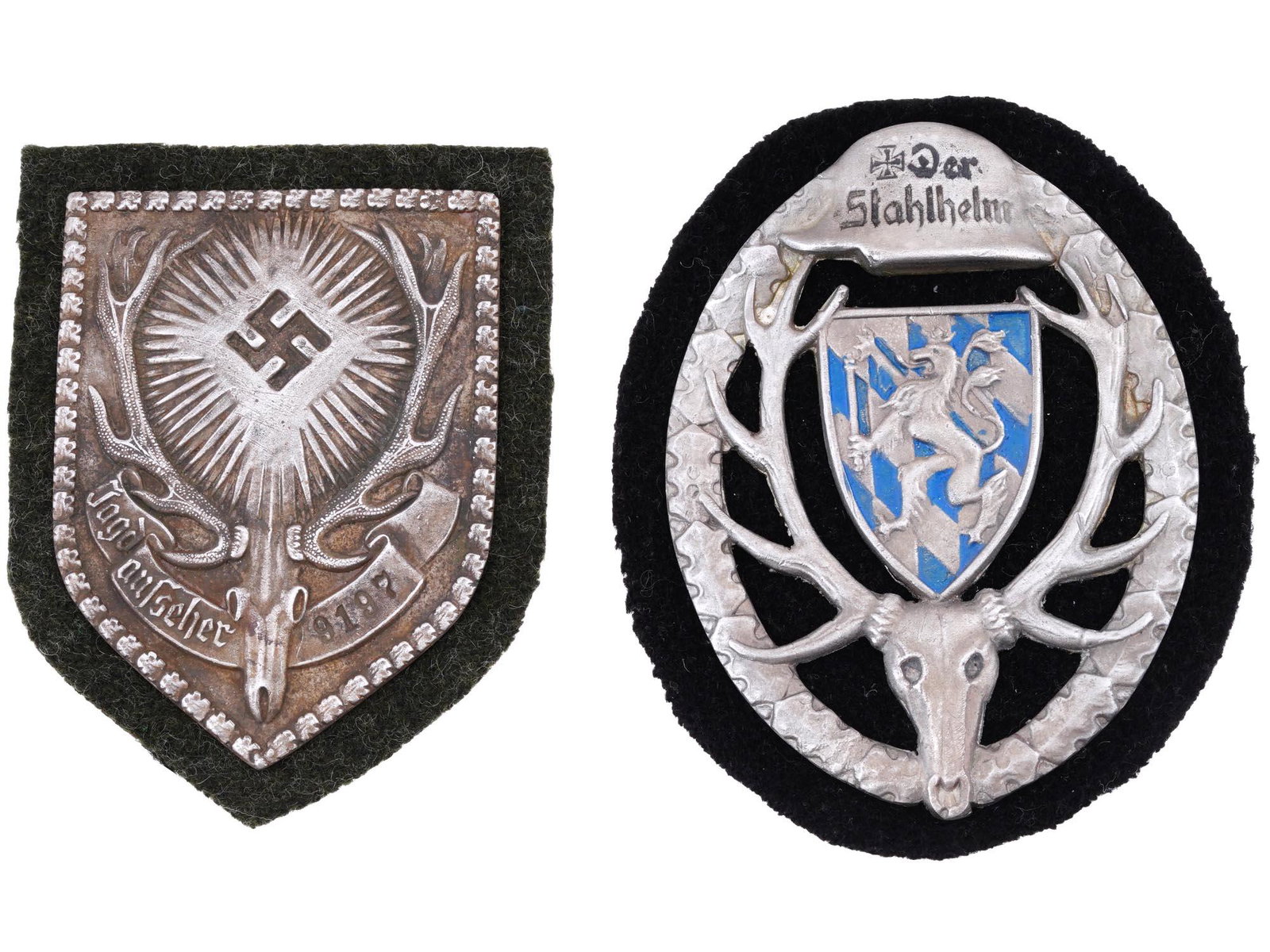 WWI WWII GERMAN HUNTING ASSOCIATION PIN BADGES: A pair of German hunting association badges including a WWI Bavarian Der Stahlhelm hunting association pin badge with a head and horns of a deer and a wreath with a helmet on top and an enameled coat 