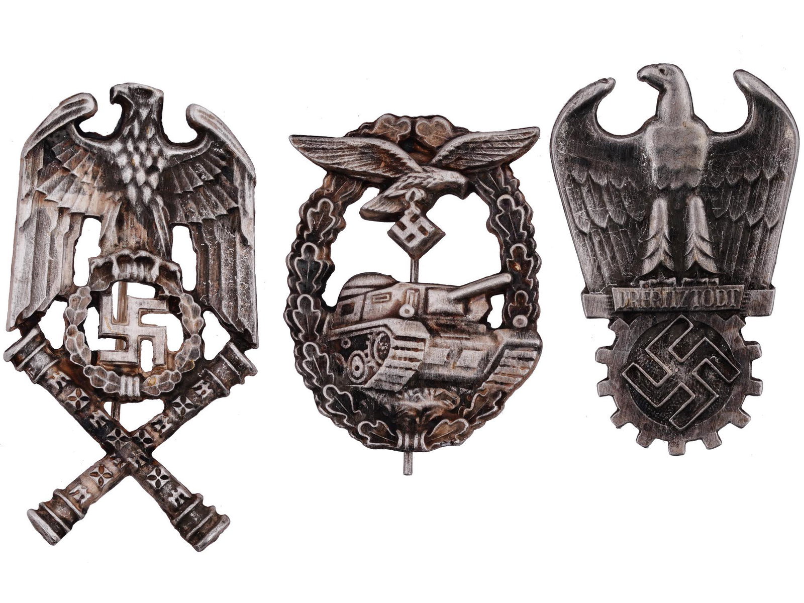 TWO WWII NAZI GERMAN BADGES AND A SHOULDER BOARD: A group of three WWII Nazi German badges including a Dr. Fritz Todt Prize award displaying a right facing national eagle perched above an Organization Todt gear and swastika device, with banner at cen