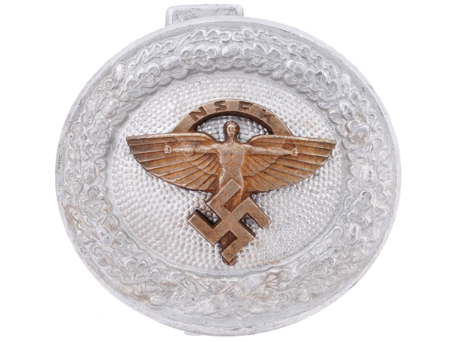 WWII NAZI GERMAN NSFK GLIDER OFFICERS BELT BUCKLE: A Nazi German NSFK Glider Korps officers belt buckle. Two piece aluminum and one piece brass construction. Decorated with an image of Icarus over a swastika encircled with a relief oak wreath. The rev