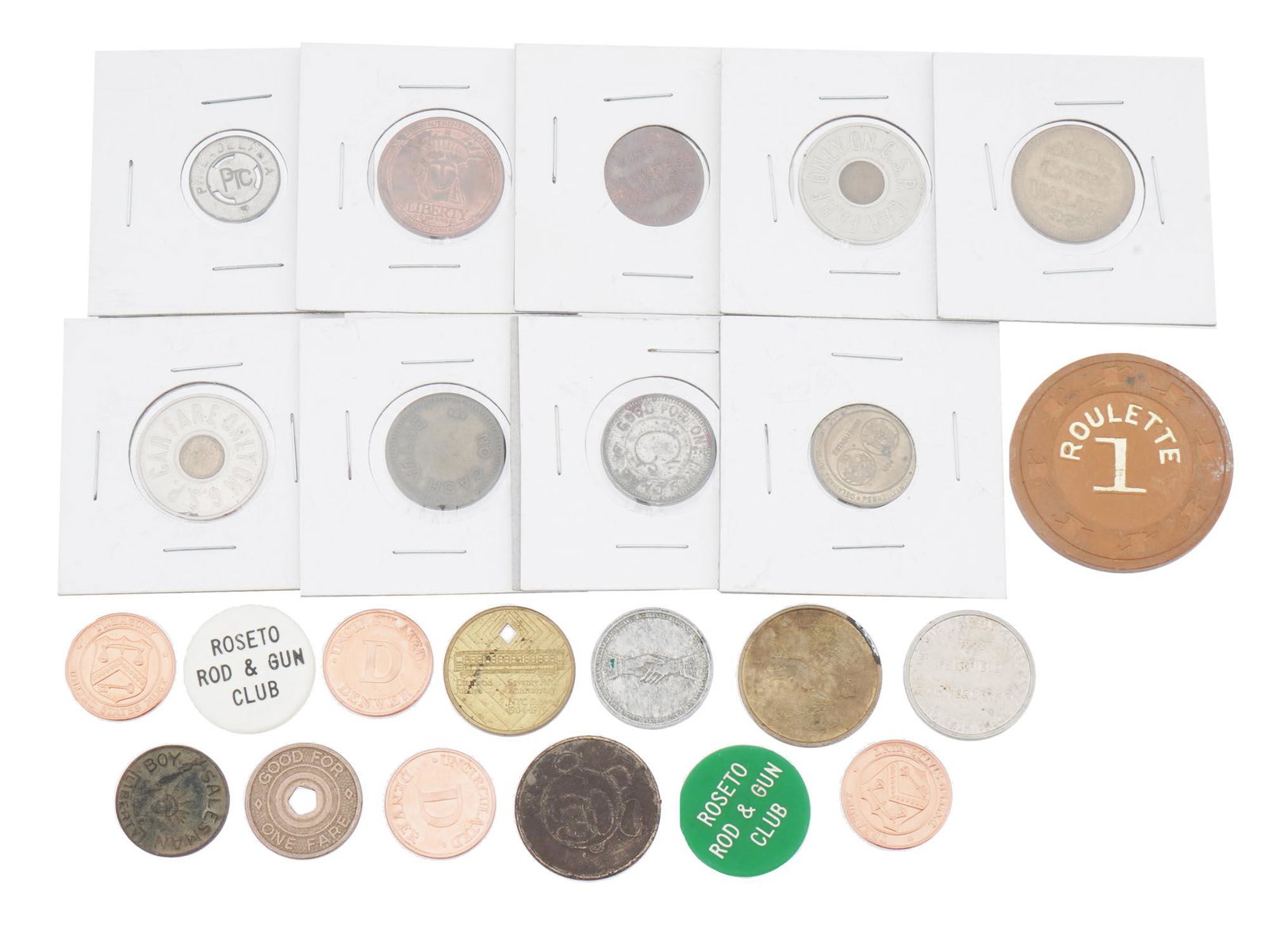 VINTAGE AMERICAN EXONUMIA TOKEN COLLECTION: A collection of vintage American Exonumia items including Good For tokens, badges, souvenir medallions, tags, and more. Circa the mid late 20th century. Vintage American Coins And Tokens Numismatic Co