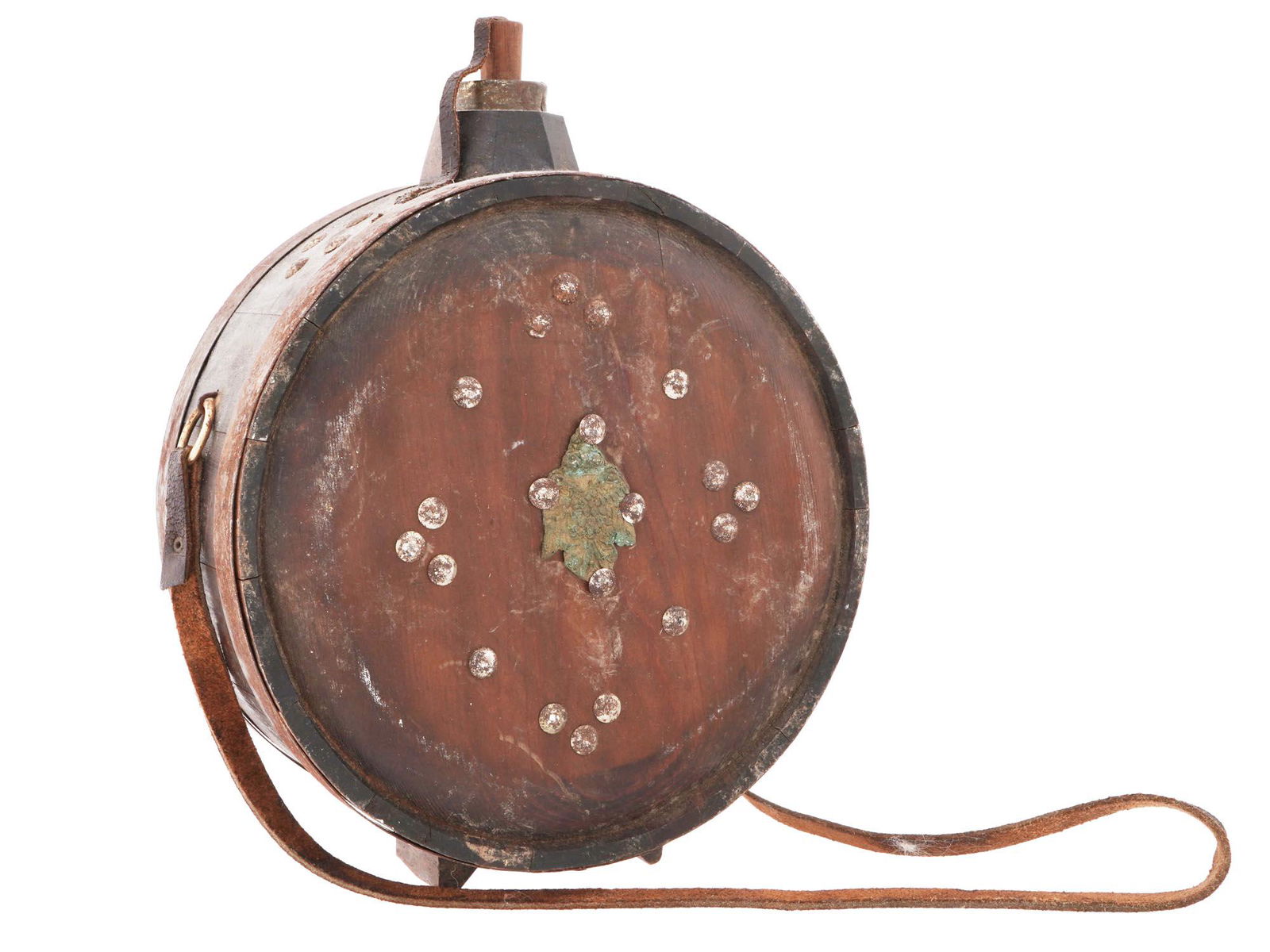 ANTIQUE GREEK CARVED WOODEN WATER FLASK BARREL: An antique late 19th to early 20th century Greek hand-carved wooden water bottle or wine flask. Footed round piece with a cork and a leather shoulder strap. Obverse and reverse of the piece are decora