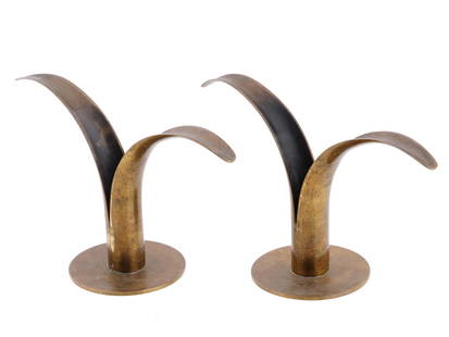 VINTAGE SWEDEN BRASS LILY CANDLE HOLDERS: A pair of vintage brass candle holders shaped as lilies. Originally designed in 1939 by Ivar Alenius Bjork and produced in Sweden by Ystad Metall. Each marked Made in Sweden for Scan Corporation. Circ