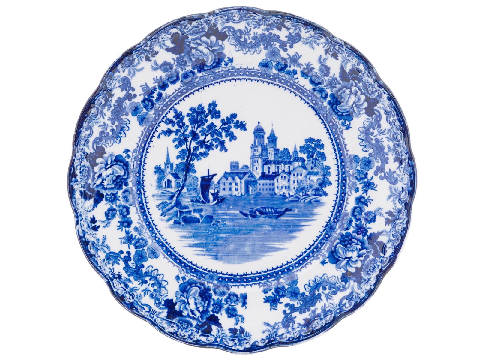 F WINKLE CO TOGO PATTERN BLUE WHITE DESSERT PLATE: An antique F. Winkle and Co blue and white semi porcelain earthenware dessert plate. The plate is adorned with a Togo floral pattern, and an image of a cityscape view in the center. Marked with a blue
