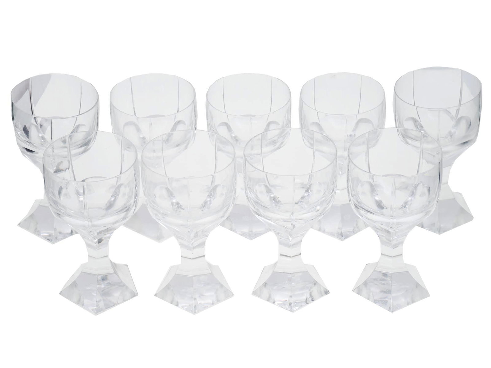 BACCARAT CRYSTAL NEPTUNE WINE GOBLETS SET: A set of vintage cut crystal wine goblets by Baccarat, a French manufacturer of fine crystal. Neptune collection. A total of 9 items. Faceted pentagonal shape. Collectible Glassware And Barware, Cryst