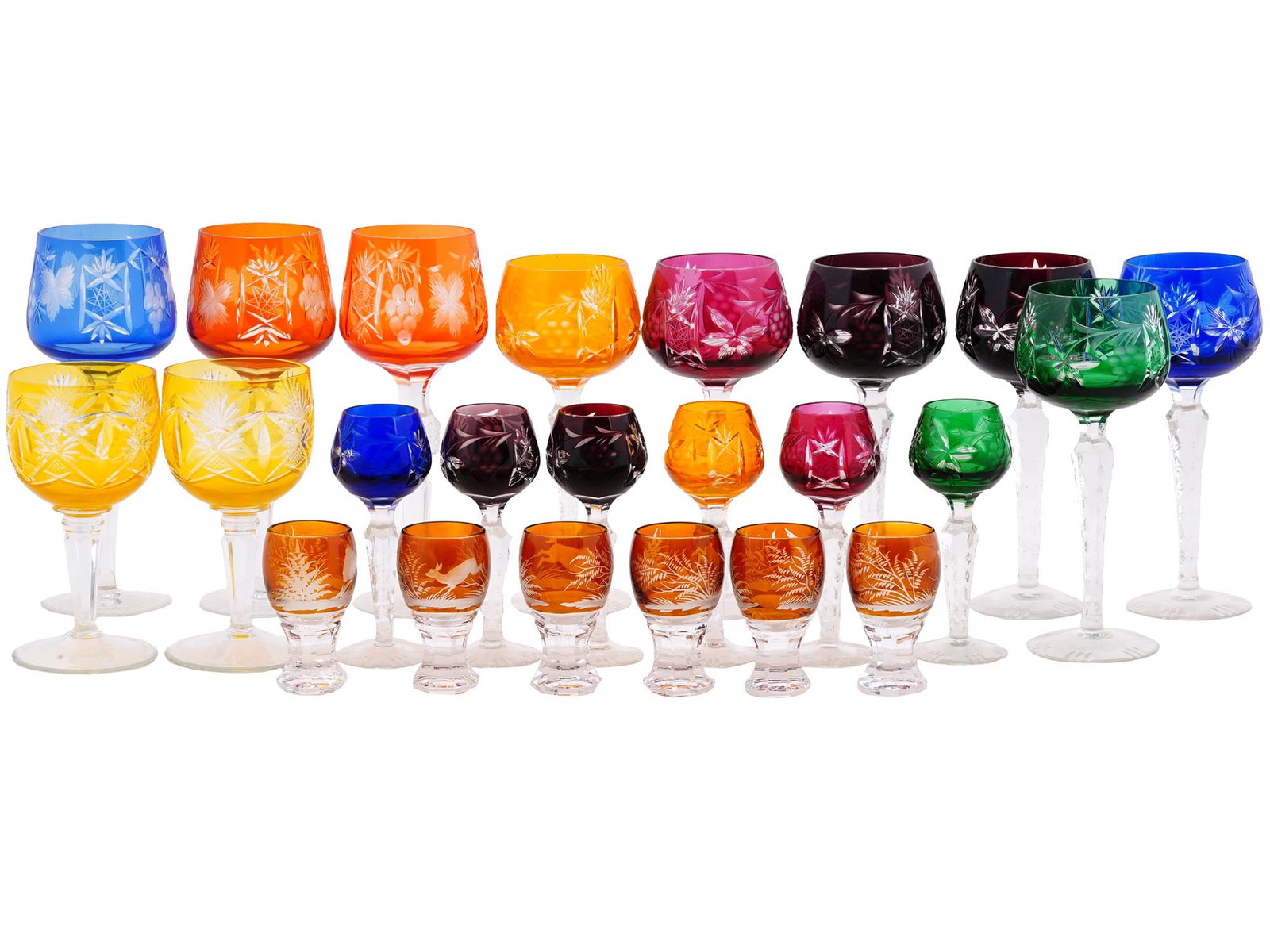 VINTAGE BOHEMIAN COLORED CRYSTAL WINE GLASSES: A large lot of Bohemian crystal wineglasses of various type and size. A total of 23 items. Cut stems, colored bowls with etched vegetal decor. Collectible Glassware And Barware, Table Setting. Dimensi