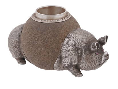 RUSSIAN SILVER CARVED SANDSTONE PIG MATCH HOLDER: A Russian silver carved sandstone match holder in the form of a pig set with red stone eyes. Marked with the 88 standard silver proof and manufacturer marks. Total weight: 200 g. Russian Silver Match