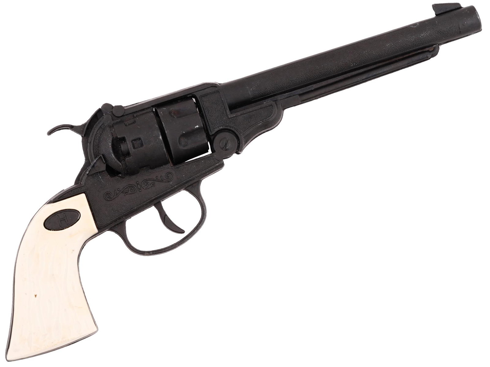 AMERICAN WESTERN LESLIE HENRY TOY CAP GUN BY HALCO: A vintage replica die cast cap gun toy by Halco, Leslie Henry Texas Star Ranger cowboy manner. The toy has a nice leaf design on the body. Marked with an H diamond mark. Circa: Mid 20th century. Vinta