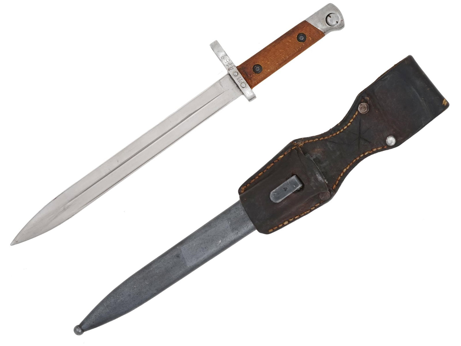 WWI CHILEAN GERMAN M1895 BAYONET WITH SCABBARD: A WWI Chilean German made Mauser M1895 bayonet featuring a steel blade marked to the ricasso. The crossguard holds etched numbers. The wooden grip is mounted by two rivets. Complete with a steel scabb