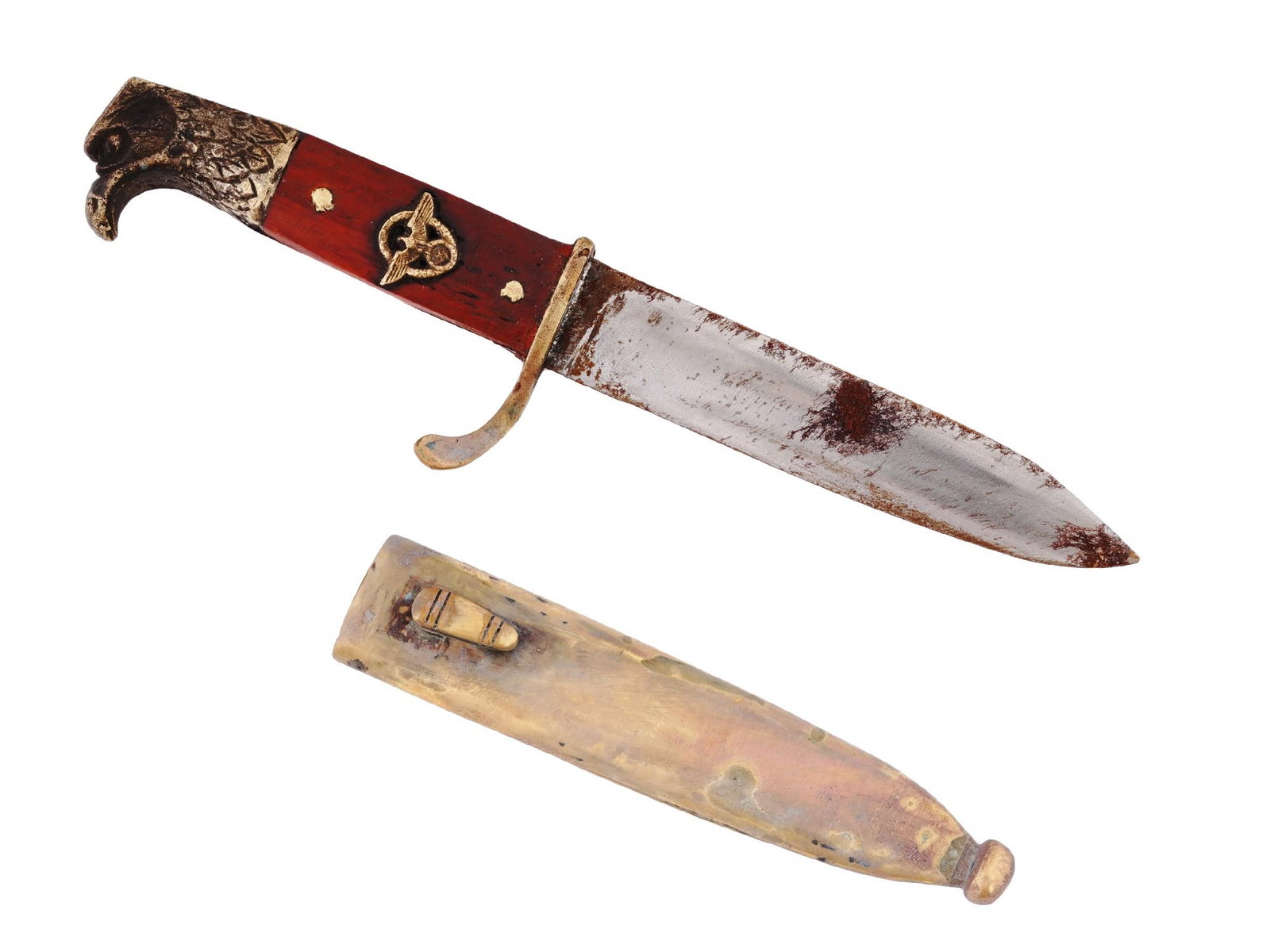 WWII GERMAN NAZI MINIATURE DRESS POLICE BAYONET: A WWII German Nazi miniature dress police bayonet featuring a nickel plated blade. The handle features an eagle head pommel with finely engraved details. On the obverse the grip is set with a brass em