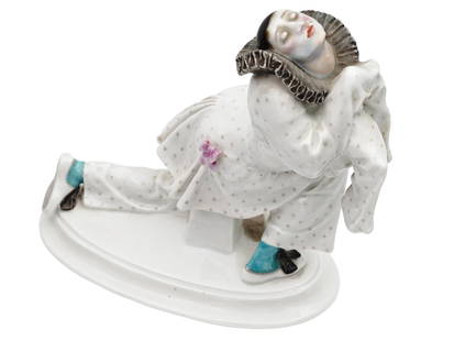 ANTIQUE ART NOUVEAU MEISSEN PORCELAIN PIERROT FIGURE: A finely modeled and beautifully hand painted early 20th century Art Nouveau Meissen porcelain figure depicting a kneeling Pierrot from the Russian ballet Carnival. Mounted on an oval base. Stamped wi