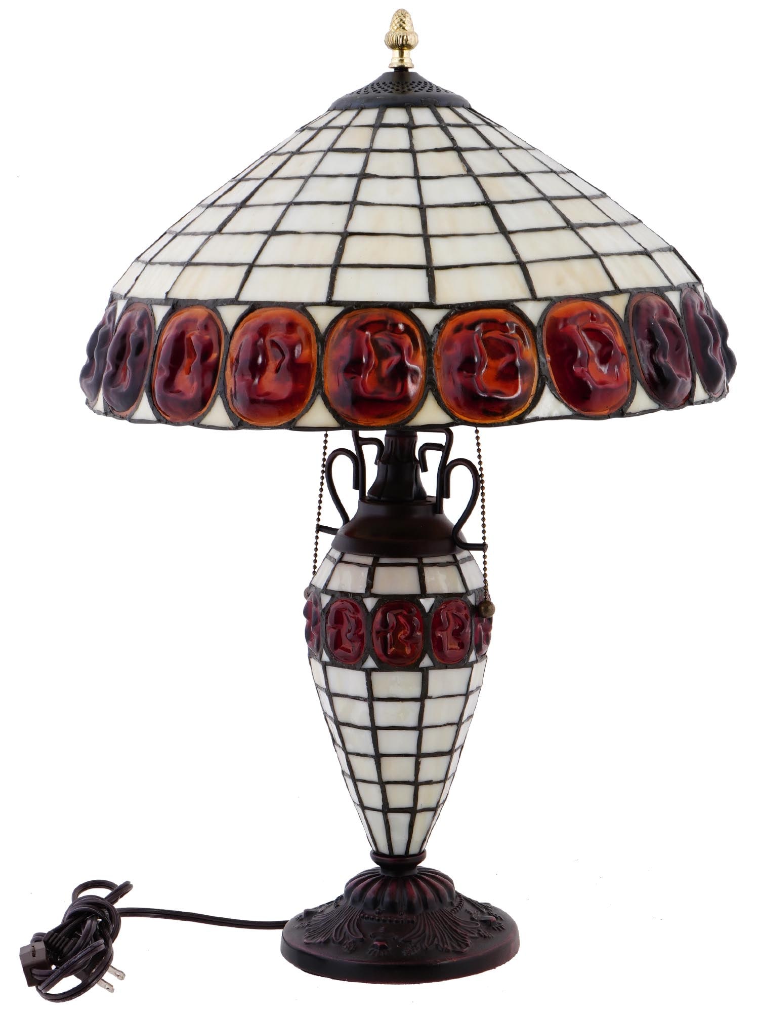TIFFANY MANNER STAINED GLASS AND BRONZE TABLE LAMP: A Modern Tiffany manner stained glass and bronze portable table lamp. The shade of the table lamp is made of cream stained glass and adorned with a relief turtleback design. Rays of light passing thro