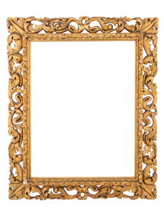 ANTIQUE 19TH C ORNATE GILT OAK WOOD PICTURE FRAME: An antique 19th-century gilt wall picture frame made of oak wood. The frame is decorated with carved vegetal decor. Gilded with red undertone. Provenance: Millea Bros Auctioneers. Wall Art Decor And P