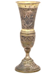 ANTIQUE 19TH C RUSSIAN SILVER NIELLO FLUTE GOBLET: A fine antique Russian silver gilt flute goblet or the slender bowl decorated with two medallions depicting townscapes and scrolled foliage using the niello technique. Raised on an expanding foot