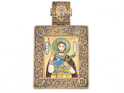 ANTIQUE RUSSIAN GILT SILVER ST VICTOR PENDANT ICON: A fine Russian gilt silver pendant with a polychrome cloisonne Orthodox icon of Holy Great Martyr Victor. The icon is enframed with intricate filigree ornaments. An embossed image of Jesus Christ garn