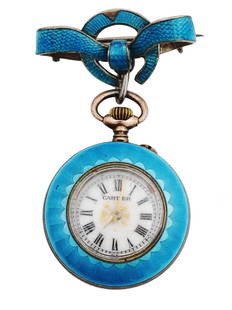 ANTIQUE FRENCH CARTIER ENAMEL WATCH BROOCH WITH RIBBON: An antique French Cartier turquoise guilloche enamel watch brooch with a ribbon and horseshoe pin suspension. Adorned with turquoise enamel, it showcases Cartiers mastery of intricate enameling techni