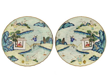 ANTIQUE CHINESE QING DYNASTY PORCELAIN SAUCERS: A fine pair of antique Chinese 19th century Famille Rose porcelain saucers, each is beautifully hand painted with a landscape scene with human figures and a pavilion on a river shore. Features a gilt
