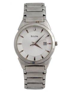 VINTAGE BULOVA CLASSIC STAINLESS STEEL WRISTWATCH: A vintage stainless steel mens analog wristwatch by Bulova. Model 96B015. Japanese quartz movement. Round bezel with single crown, white guilloche dial with silver baton index, date window and