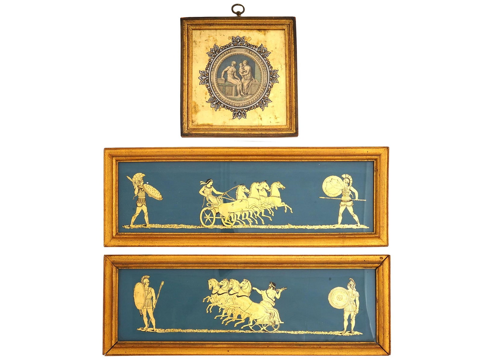 MID CENT ART LORE NEOCLASSICAL PAINTINGS ON GLASS: A lot of three mid-20th century painting on glass in Neoclassical style. Two frize paintings depicting chariots and Romans soldiers. A medallion representing a nude man and woman with child. The artwo