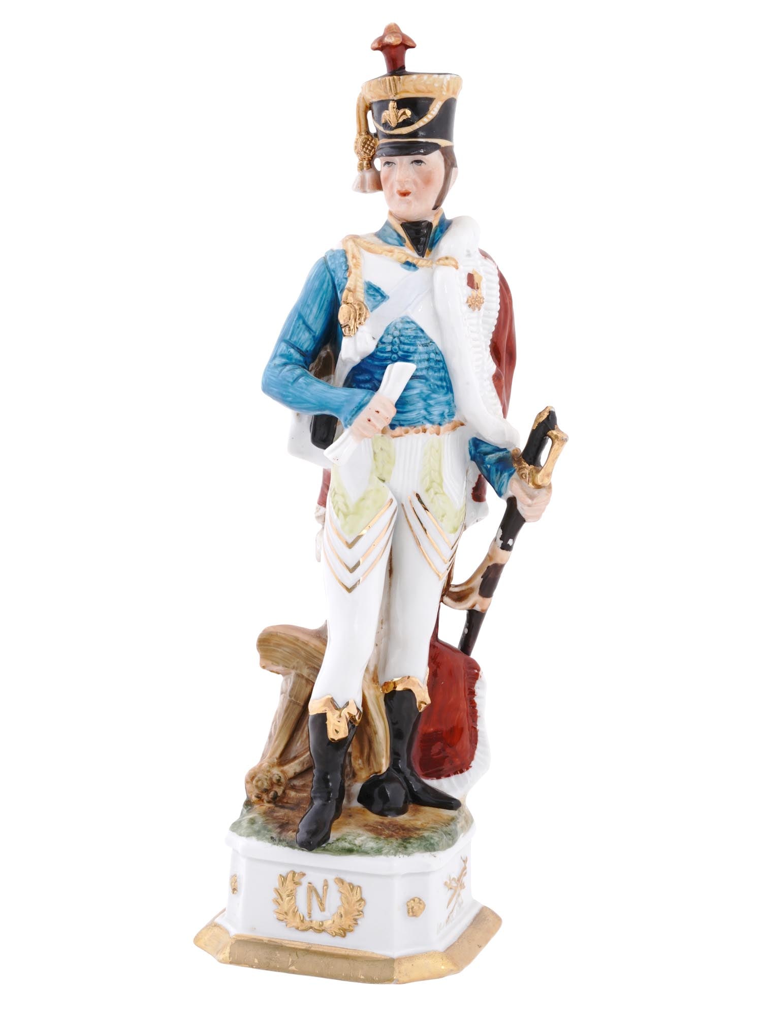 VTG CAPODIMONTE DI PIETRO PORCELAIN SOLDIER FIGURINE: A vintage Italian Capodimonte Di Pietro porcelain Napoleonic figurine, featuring a soldier elegantly poised on a base adorned with the iconic N encircled by a laurel wreath, symbolizing the Napoleonic