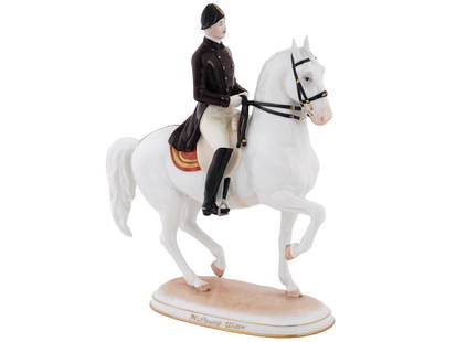 AUSTRIAN RIDING SCHOOL MILITARY PORCELAIN FIGURE: A vintage military polychrome porcelain figurine by Augarten Wien Vienna Porcelain Manufactory, Austrian, founded 1718. The figure depicts a Spanish Riding School equestrian figure comprising Piaffe.