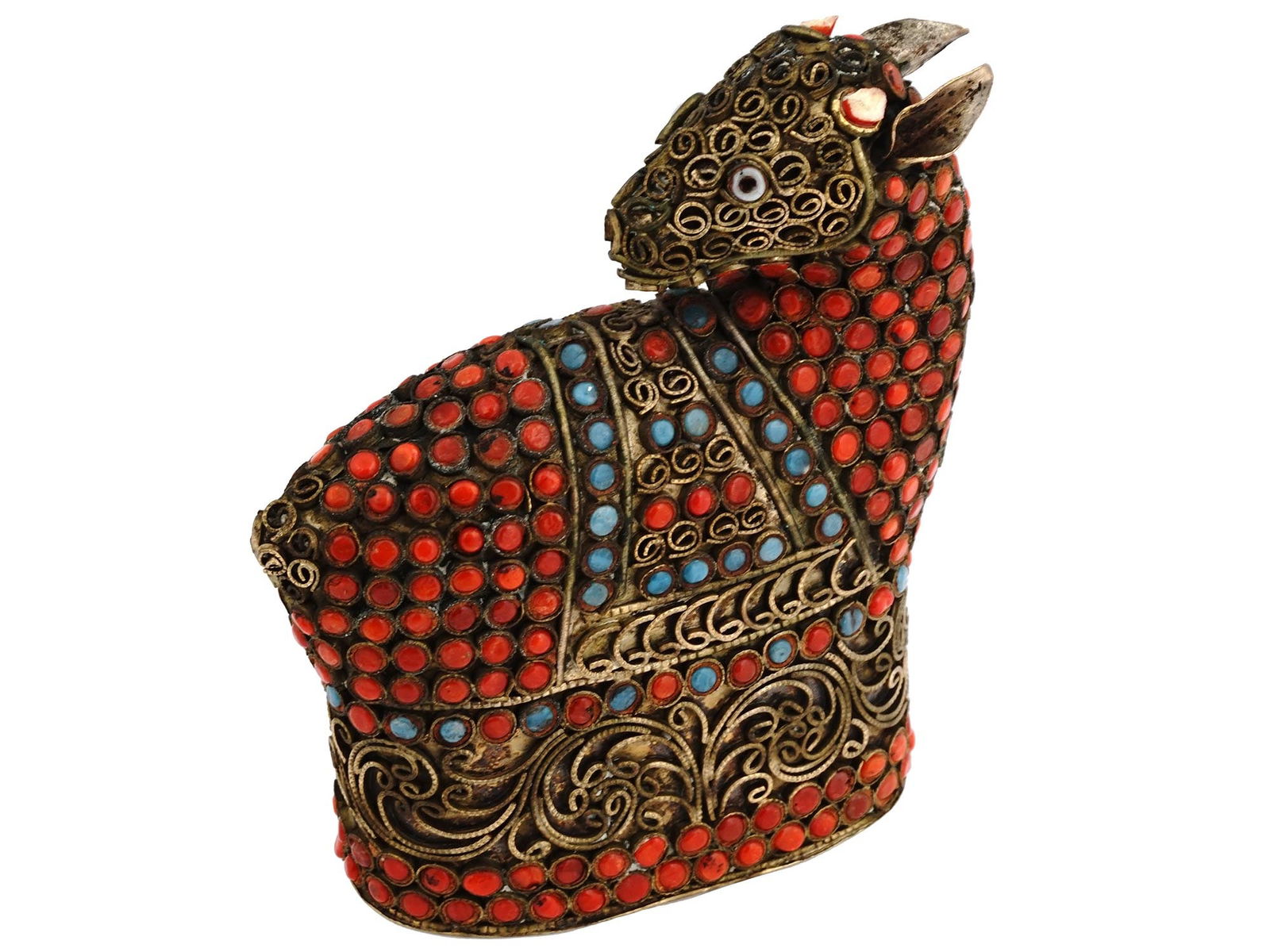 VINTAGE NEPAL BRASS TURQUOISE AND CORAL SEED DONKEY: A vintage Nepalese brass donkey figurine exquisitely sculpted, capturing its distinctive features with a touch of whimsy and authenticity. The incorporation of turquoise and coral seeds adds a vibrant