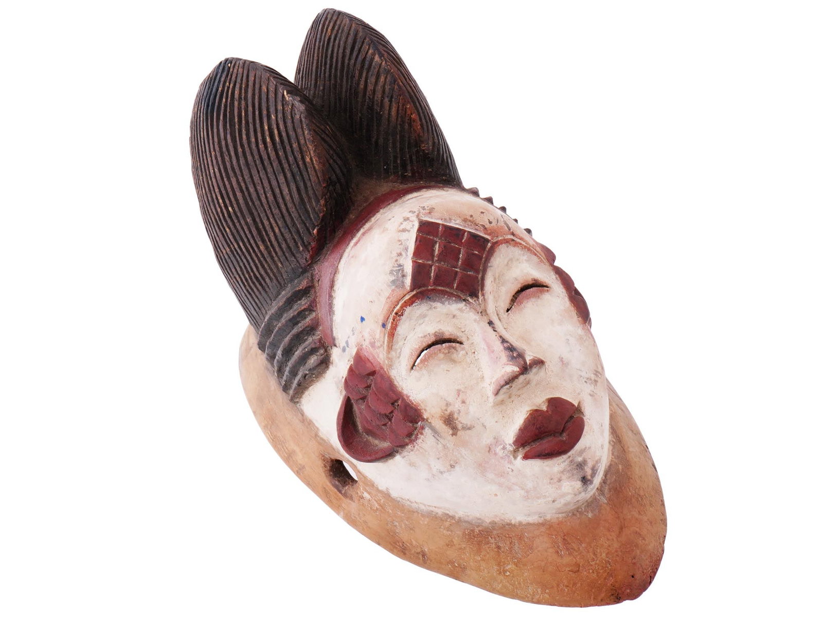 TRADITIONAL CENTRAL AFRICAN GABON WHITE PUNU MASK: A Central African white Punu mask from Gabon. This mask is a striking representation of the artistic traditions and cultural expressions of the Punu people in Central Africa.Punu masks hold deep cultu
