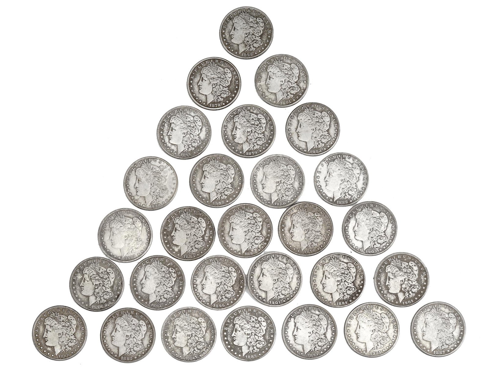 AMERICAN MORGAN DOLLAR COINS COLLECTORS REPLICA: Collectors replica of twenty eight American Morgan One Dollar coins with the obverse featuring Liberty facing left, her hair in a Phrygian cap, and with Liberty inscribed on a ribbon or band holding a