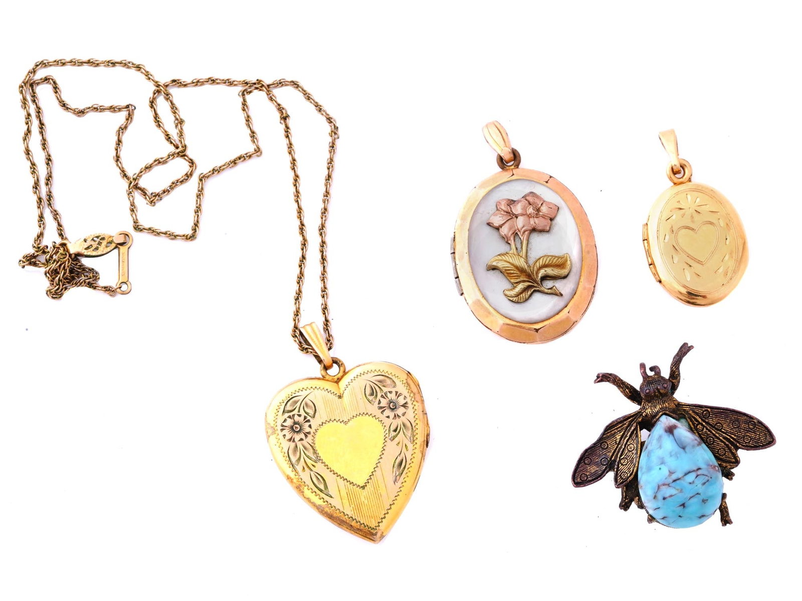 VINTAGE GOLD PLATED LOCKET PENDANTS AND PIN BROOCH: A vintage jewelry set that includes a fly-shaped pin brooch, adorned with a captivating turquoise stone, a 12k gold-filled locket pendant featuring a delicate relief flower image, a Simmons 10k gold p