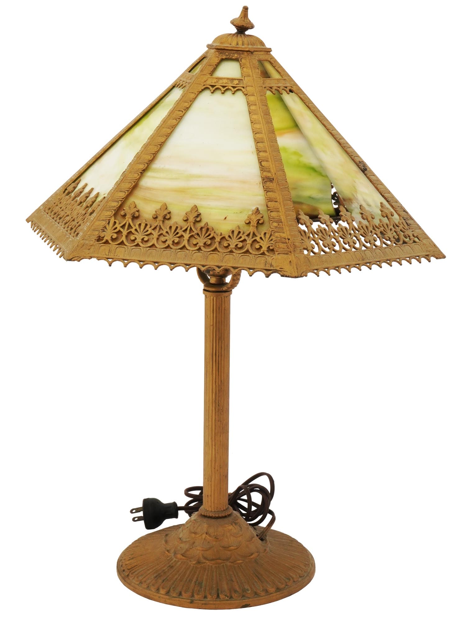 RAINAUD BRONZE TABLE LAMP WITH SLAG GLASS SHADE: An antique early 20th-century bronze table lamp by Rainaud. The fluted shaft holds a single light bulb. The shade has a faceted hexagonal shape with decorative finials on the rims. The shade is made o