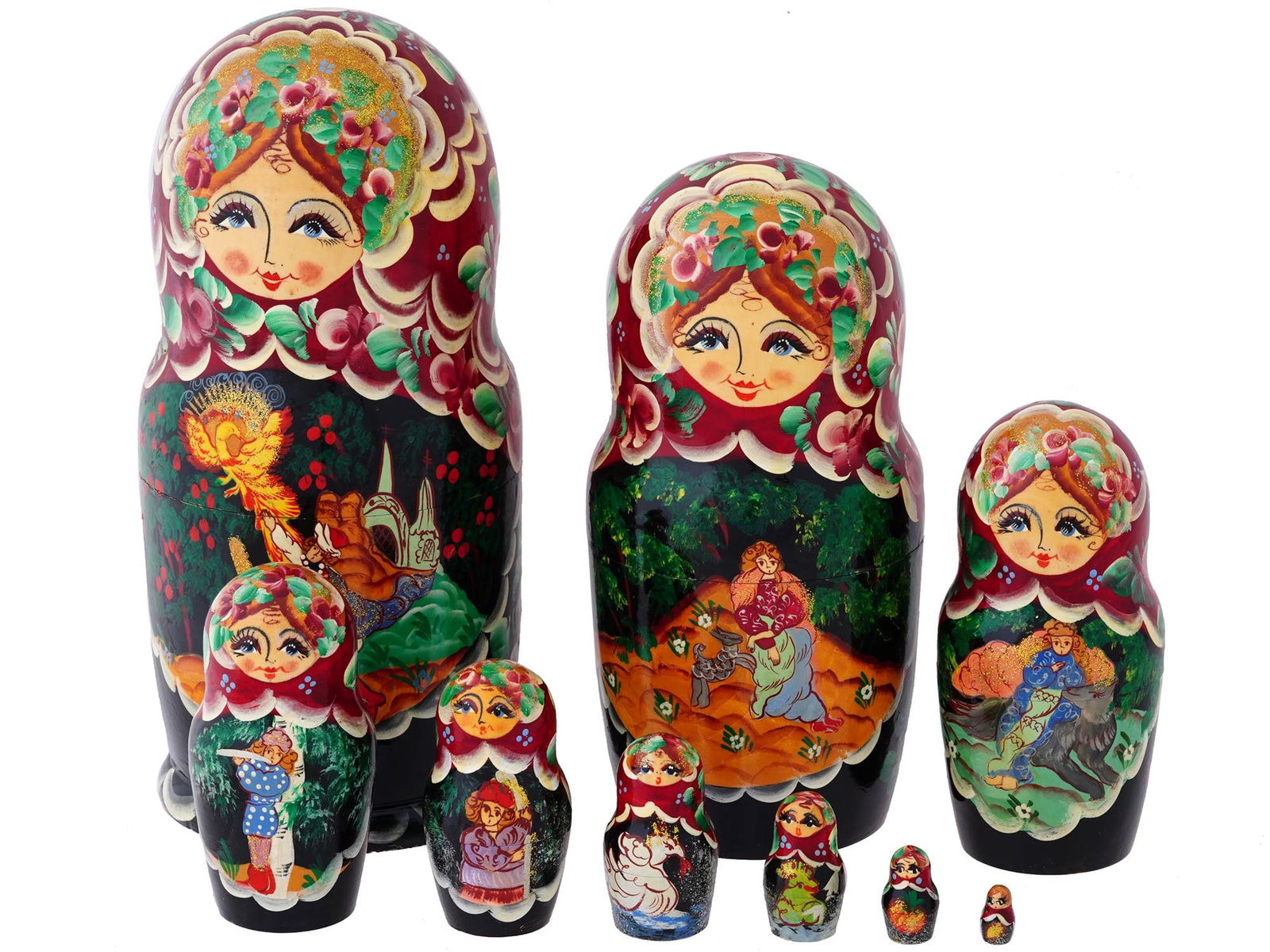 VINTAGE RUSSIAN HAND PAINTED WOODEN NESTING DOLLS: A vintage Russian hand painted wooden Matryoshka nesting dolls, a true masterpiece of artistic expression. Crafted with meticulous attention to detail, this set consists of nine nested dolls, each han