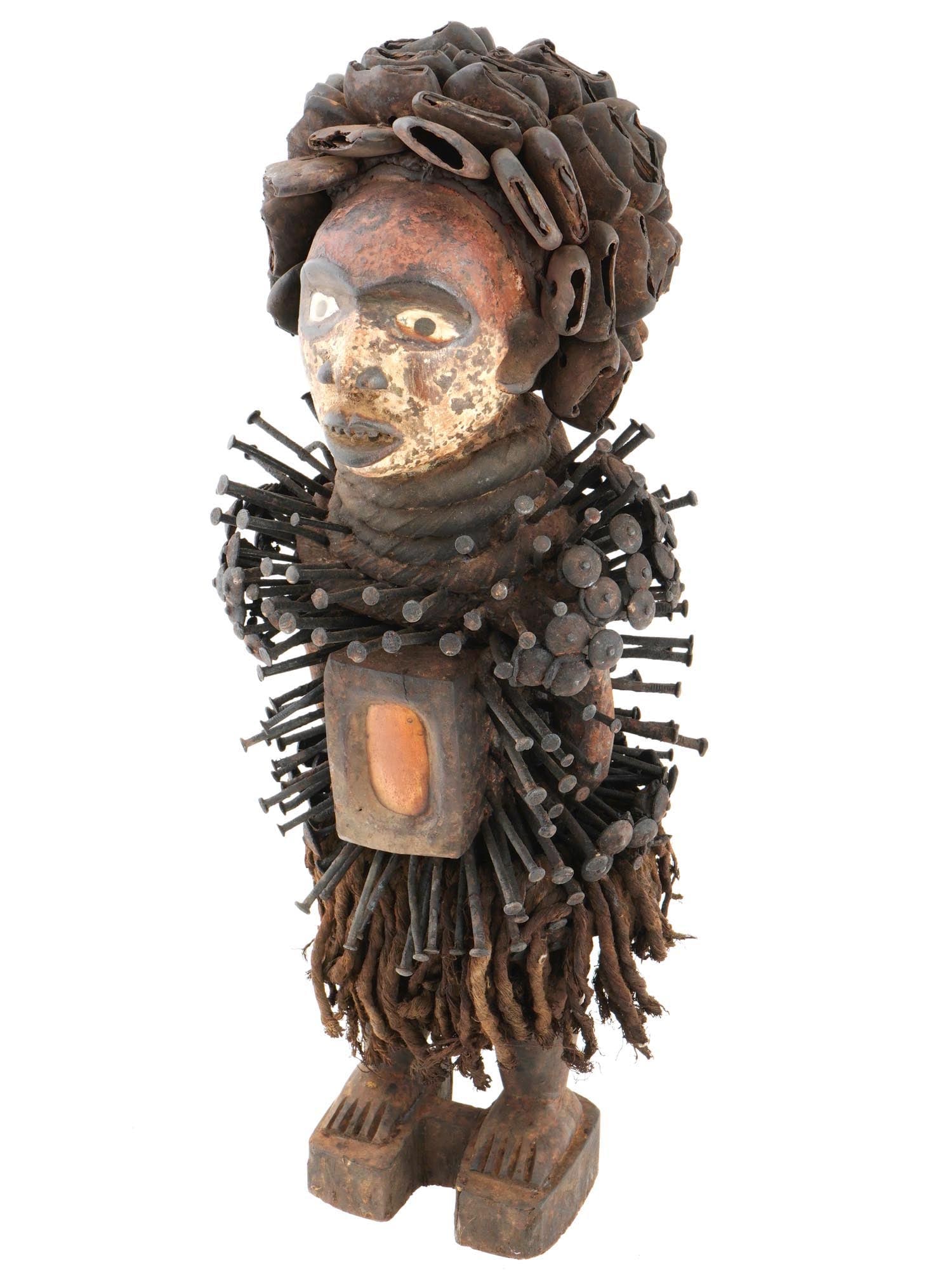 CENTRAL AFRICAN CONGO METAL WOOD NAIL NISKI FIGURE: A Central African Congo mixed media nail figure. This figure is known as a Niski figure. Niski is the name given by Kongo peoples and other ethnic groups living in the Democratic Republic of Congo to 