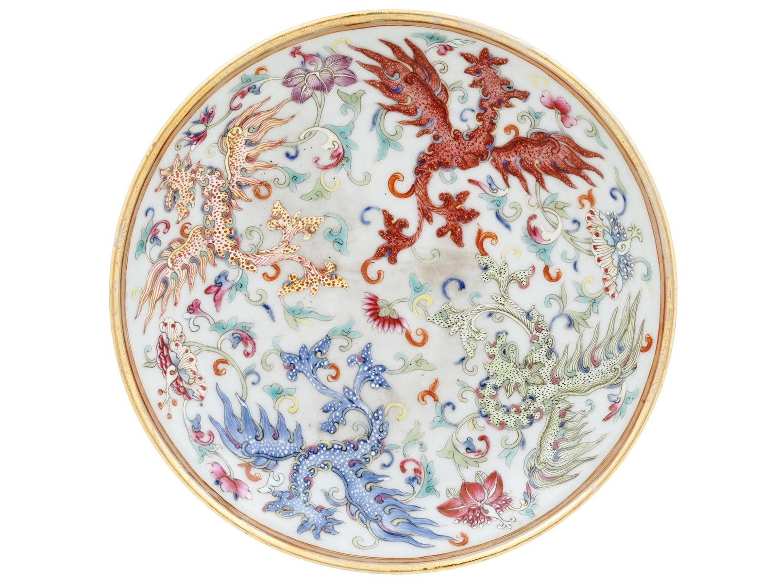 ANTIQUE CHINESE PORCELAIN PAINTED PHOENIX PLATE: An antique Chinese Qing dynasty Guangxu period famille rose porcelain plate with shallow rounded walls. The interior is painted with four colored winged phoenix birds amongst lotus scrolls, the exteri