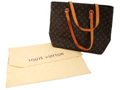 LOUIS VUITTON BROWN LEATHER TOTE BAG WITH POUCH: A vintage ladies shoulder bag by Louis Vuitton, a French luxury fashion house. Leather body with classic LV pattern. Leather handles. Top zip closure. Golden hardware. Fabric lining, single inner slid